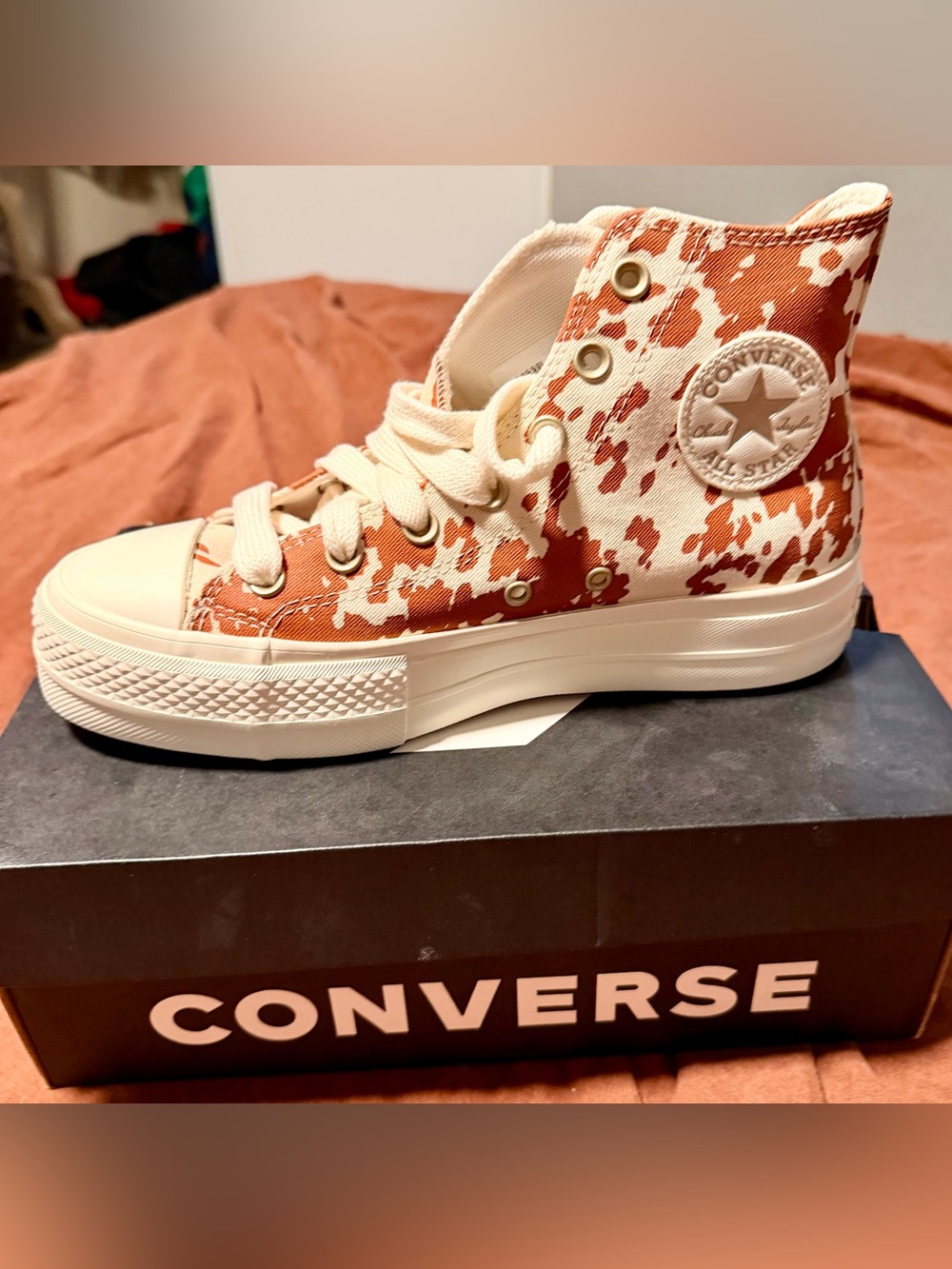 Converse High Top Platform Sneakers in Tan and Cream Cow Print